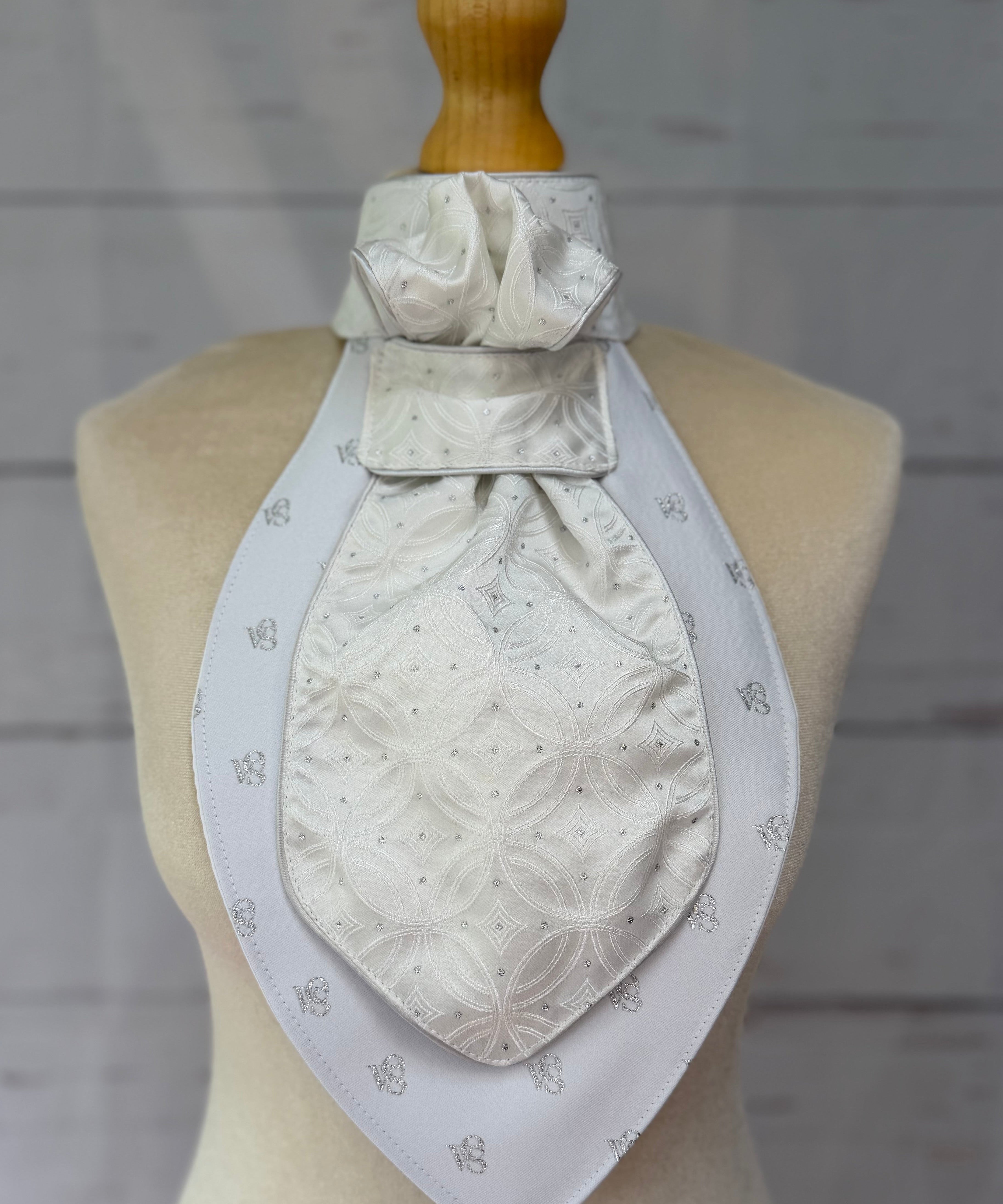 an equestrian ready tied stock tie on a mannequin 