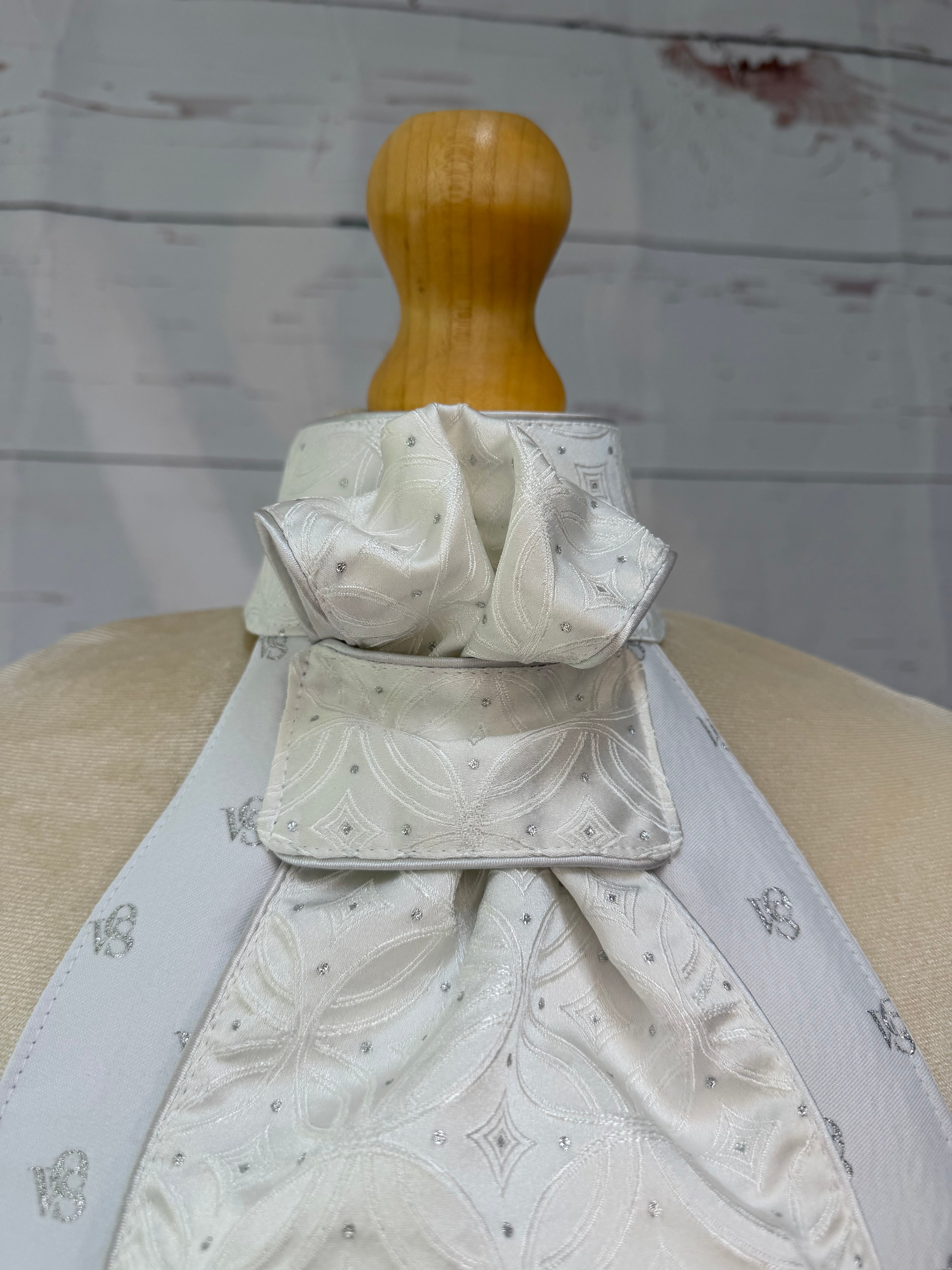 an equestrian ready tied stock tie on a mannequin 