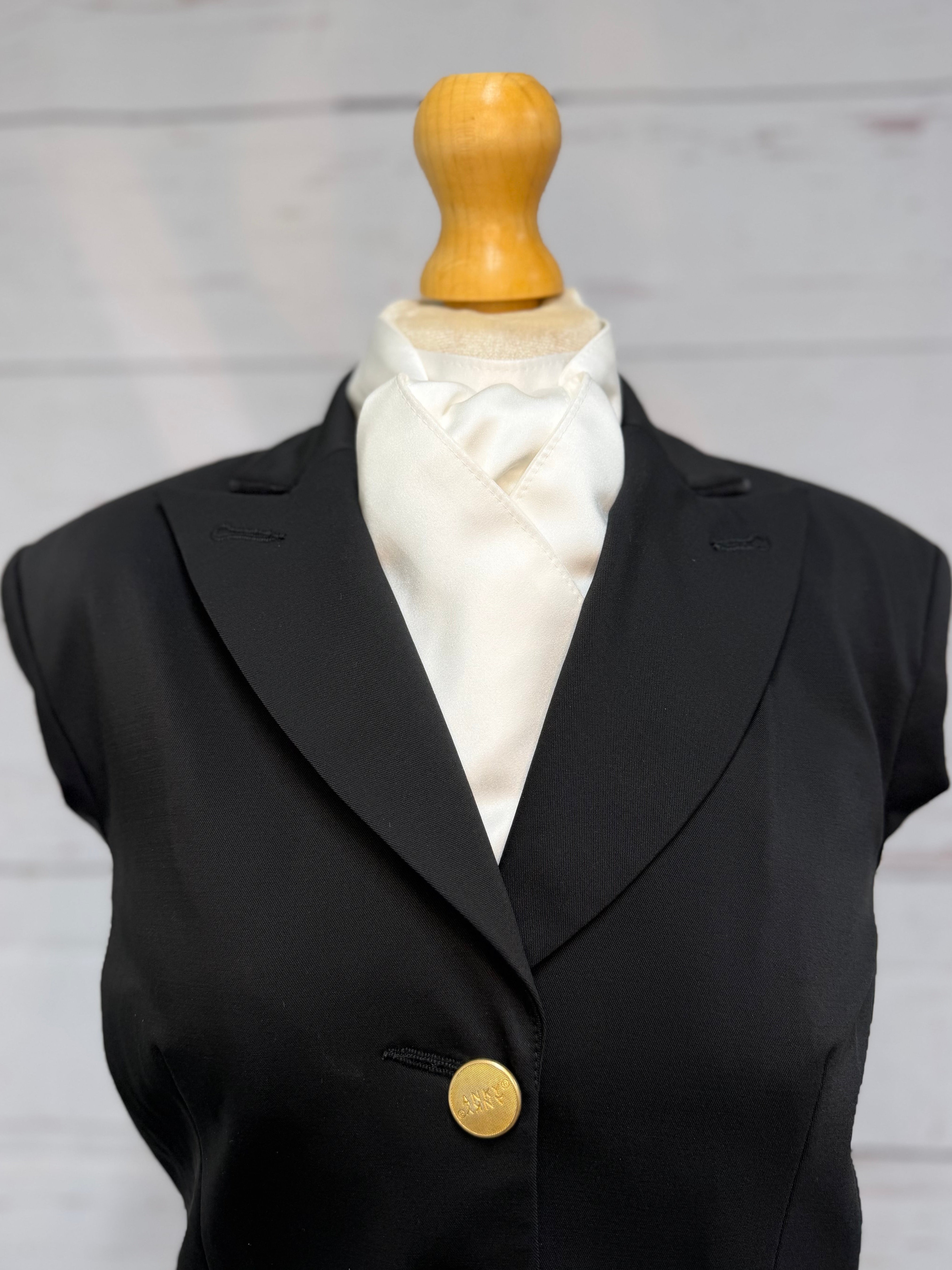 black jacket on mannequin with satin white stock tie 